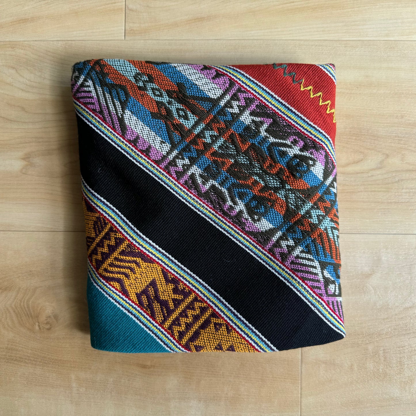 Sacred Mesa cloth folded in a bundle from the High Andes. Hand woven from hand dyed Alpaca wool in a variety of colors. Cloth can be used for your work with the Mesa, Sacred Medicine bundle, and/or as an Altar cloth.